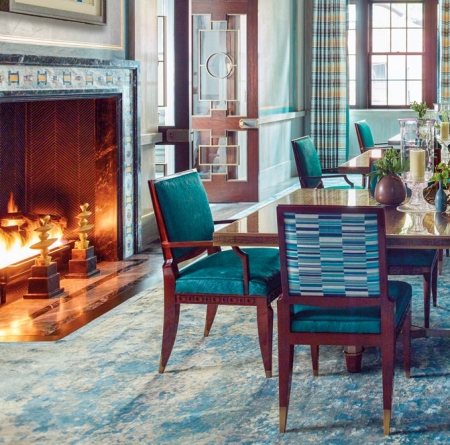 The andirons are an exceedingly pleasing fit within the overall feel of this Steven Gambrel designed home, as shown in this image from Galerie magazine. (Source image by Eric Piasecki.)